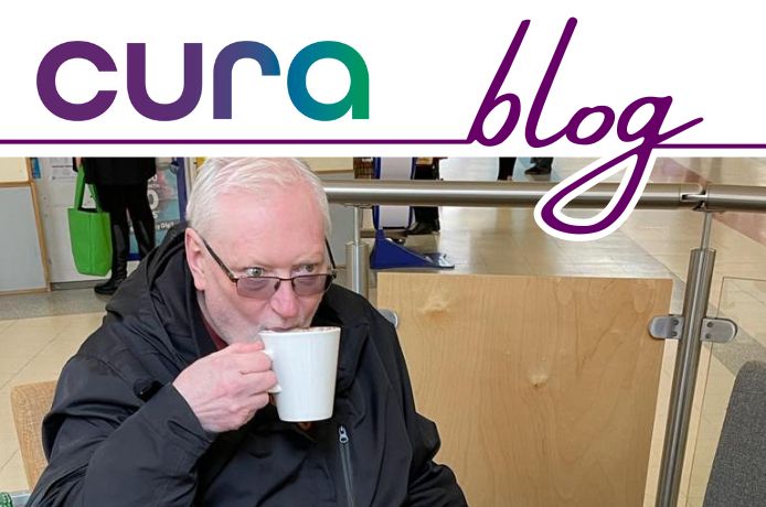 Richard Lemmon having a drink in a cafe, living with Parkinsons